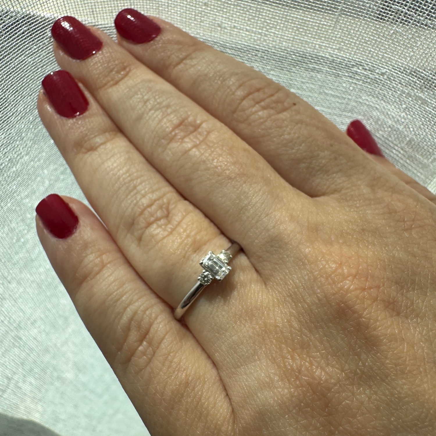 Emerald and Round Cut Diamond Ring